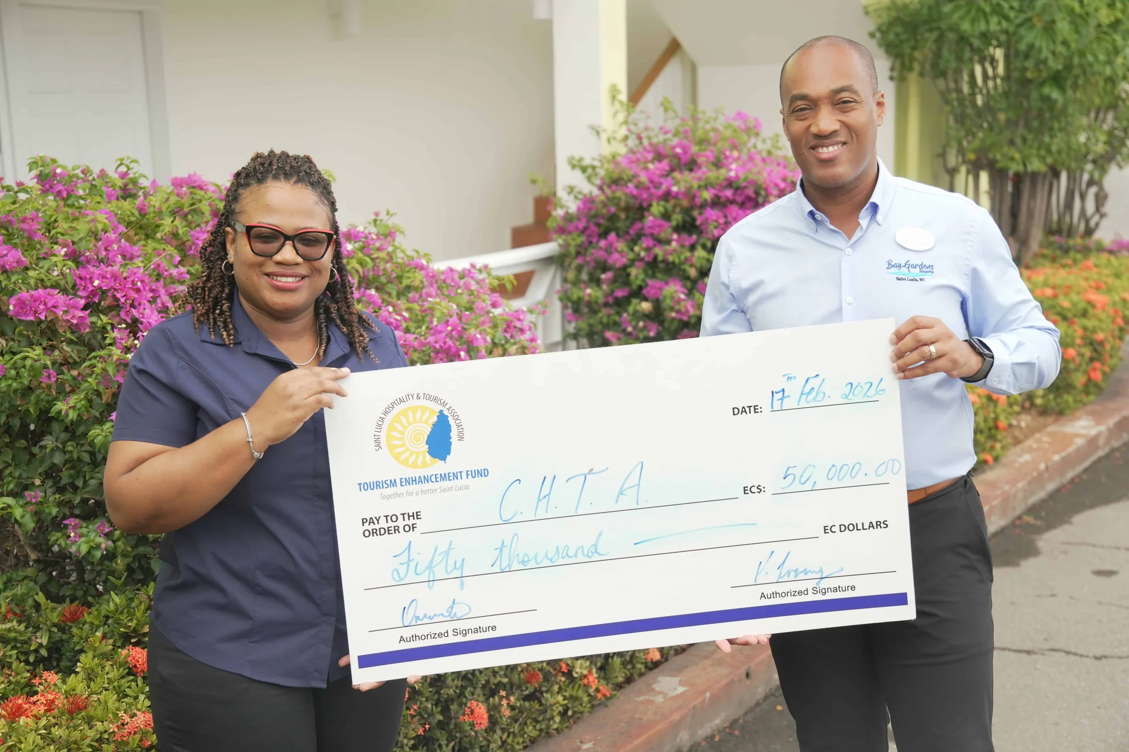 TEF presents a cheque for EC$50,000 to the C.H.T.A.