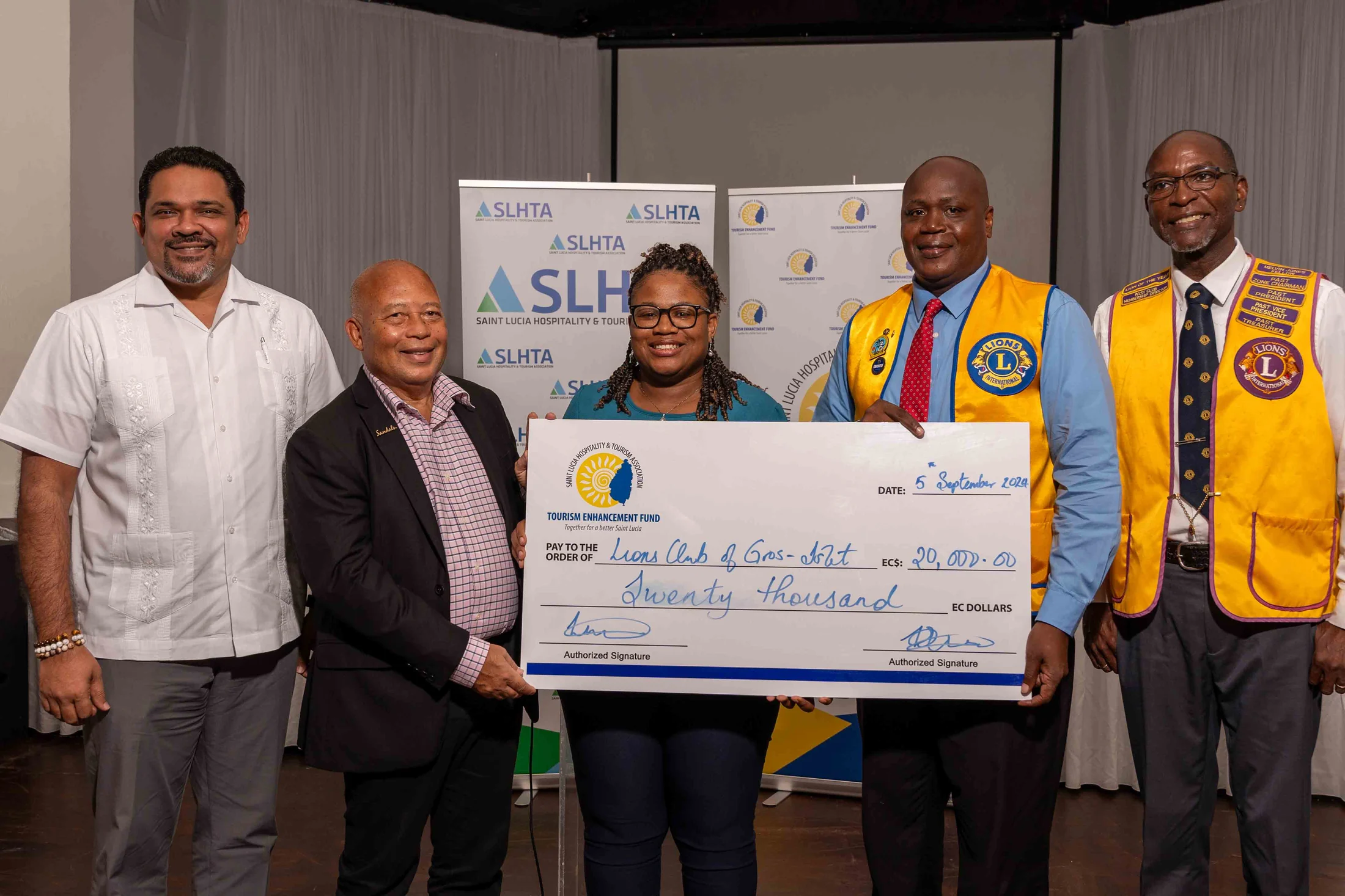 TEF presents a cheque for EC$20,000 to the Lions Club of Gros Islet