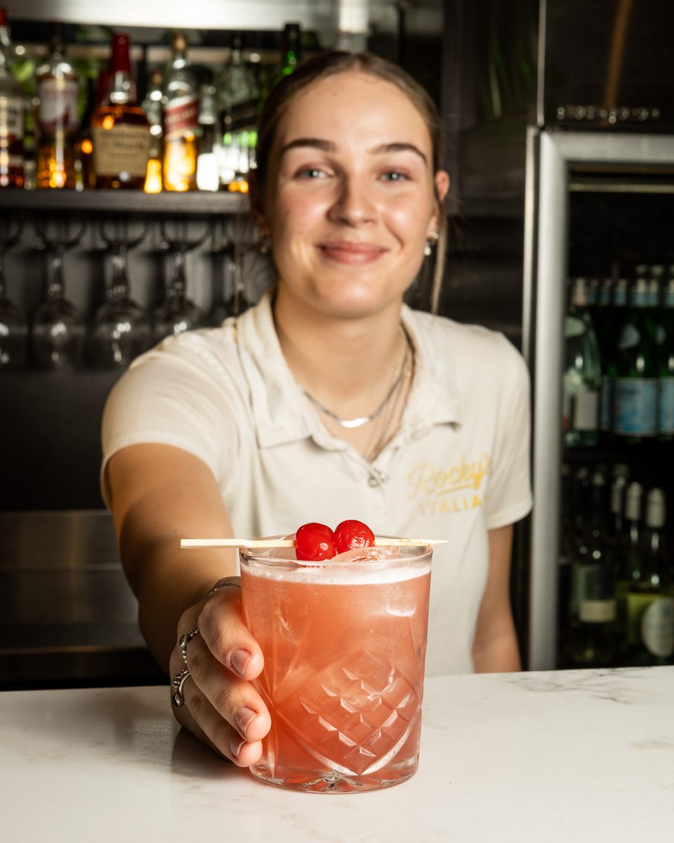 A Chambord Vanilla Sour served across the Rocky's Italian bar