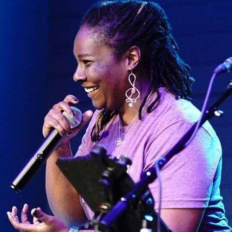 Jori O'Neale hosting with a microphone