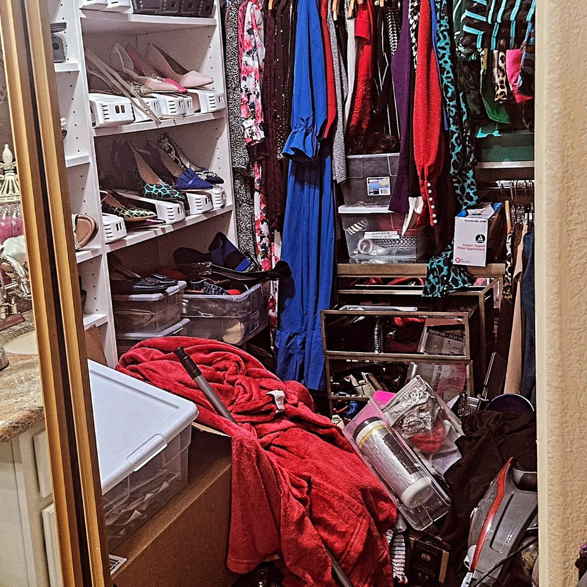 Before: a cluttered Scottsdale walk-in closet