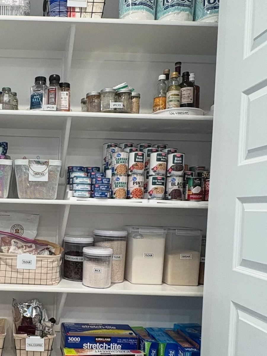 After: pantry organized with labeled bins
