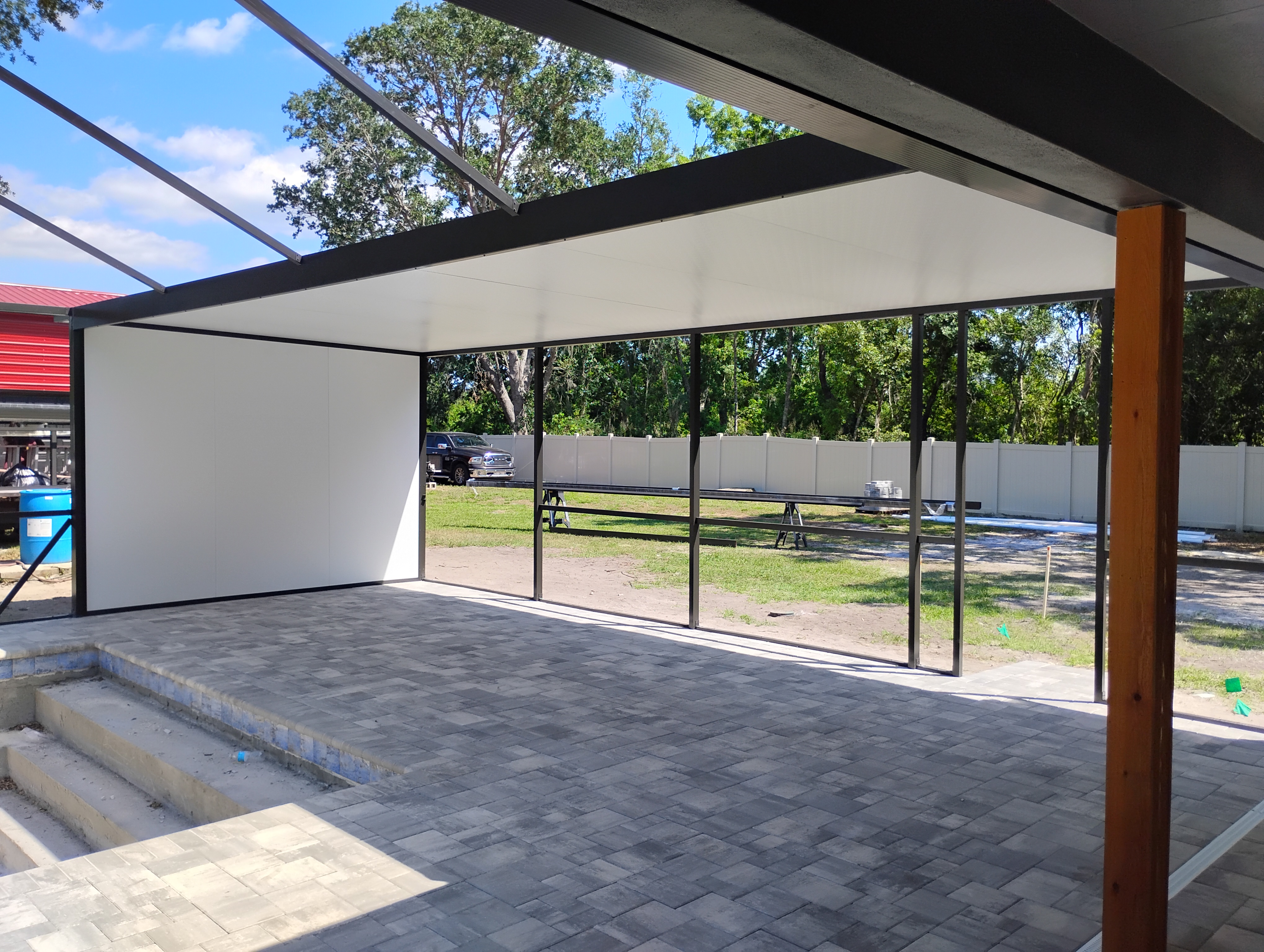 Patio Covers & Solid Composite Roofs project by Screen Boss in Tampa Bay, FL