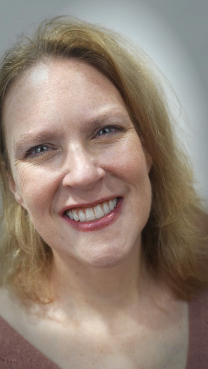 Carolyn smiling after treatment
