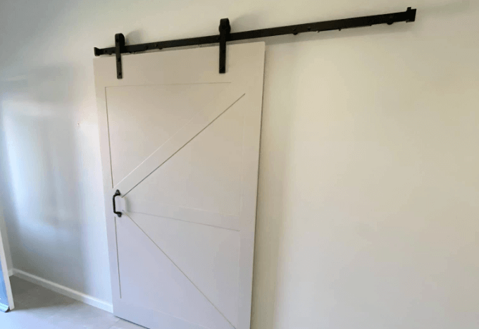 Rustic custom barn doors adding character and charm, perfect for barn doors in Plettenberg Bay homes.