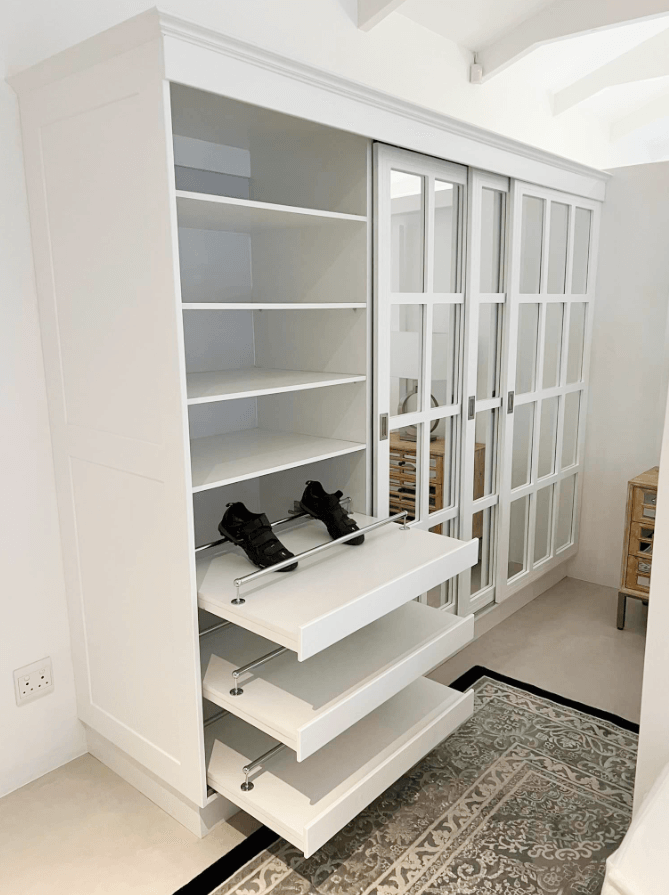 Stylish custom built-in cupboards designed to optimize storage and enhance elegance in a Plettenberg Bay home.