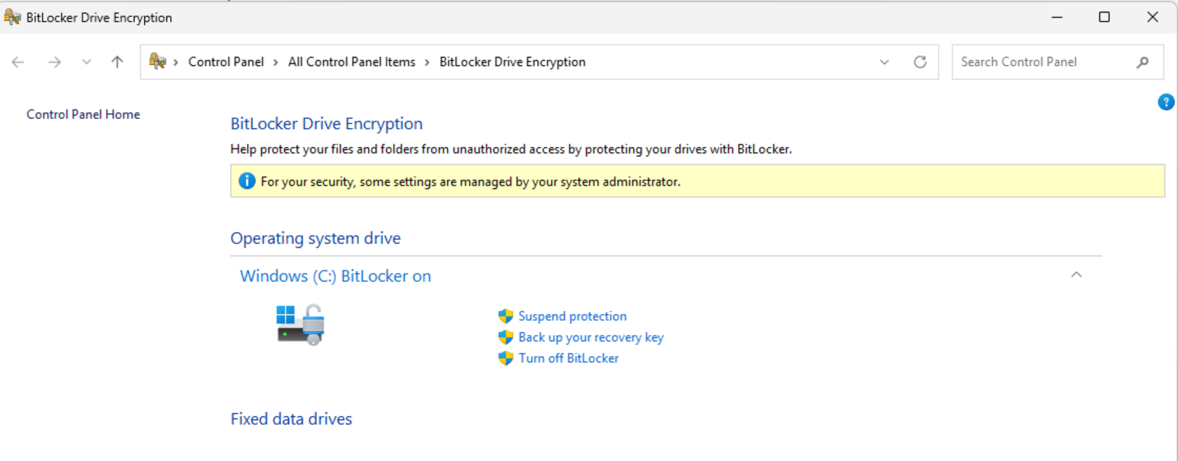 The Manage BitLocker screen in Windows 11 Pro, showing the Back up your recovery key link.