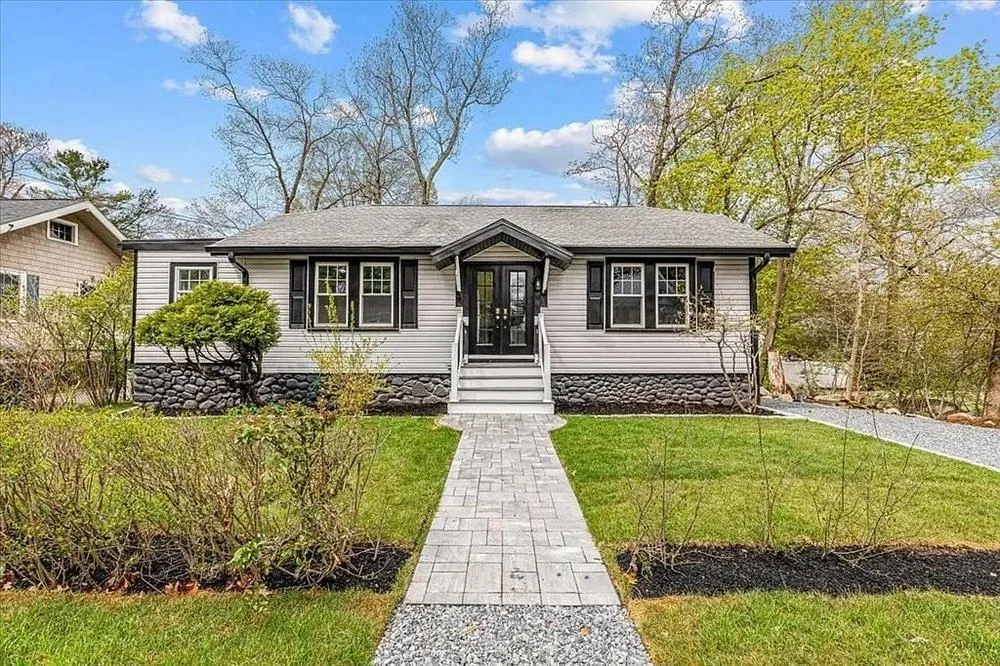 Ranch home with a new roof after replacement in South Shore Massachusetts