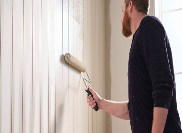 Faded and discolored wall paint showing a home needs repainting