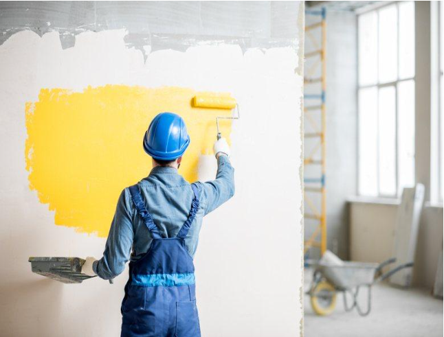 Faded and discolored wall paint showing a home needs repainting