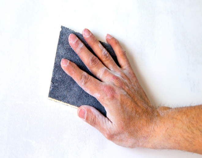 Chalky paint residue on hand showing the paint surface is breaking down