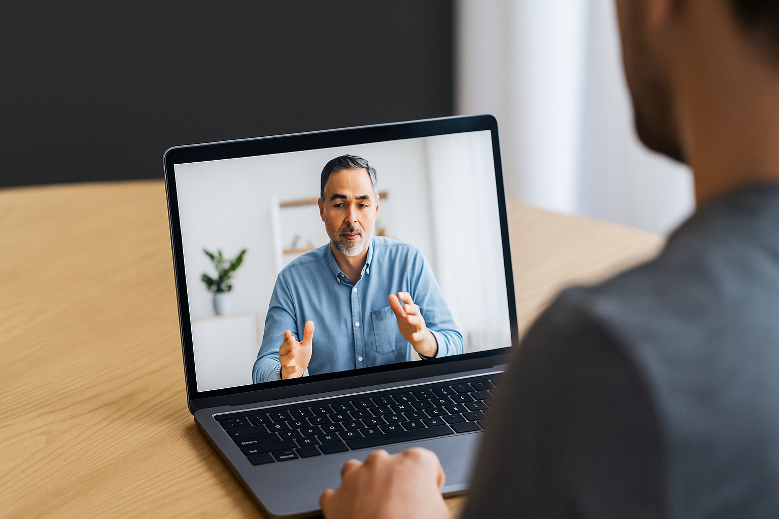 Person on a telehealth video call learning about TRT in a bright home setting.