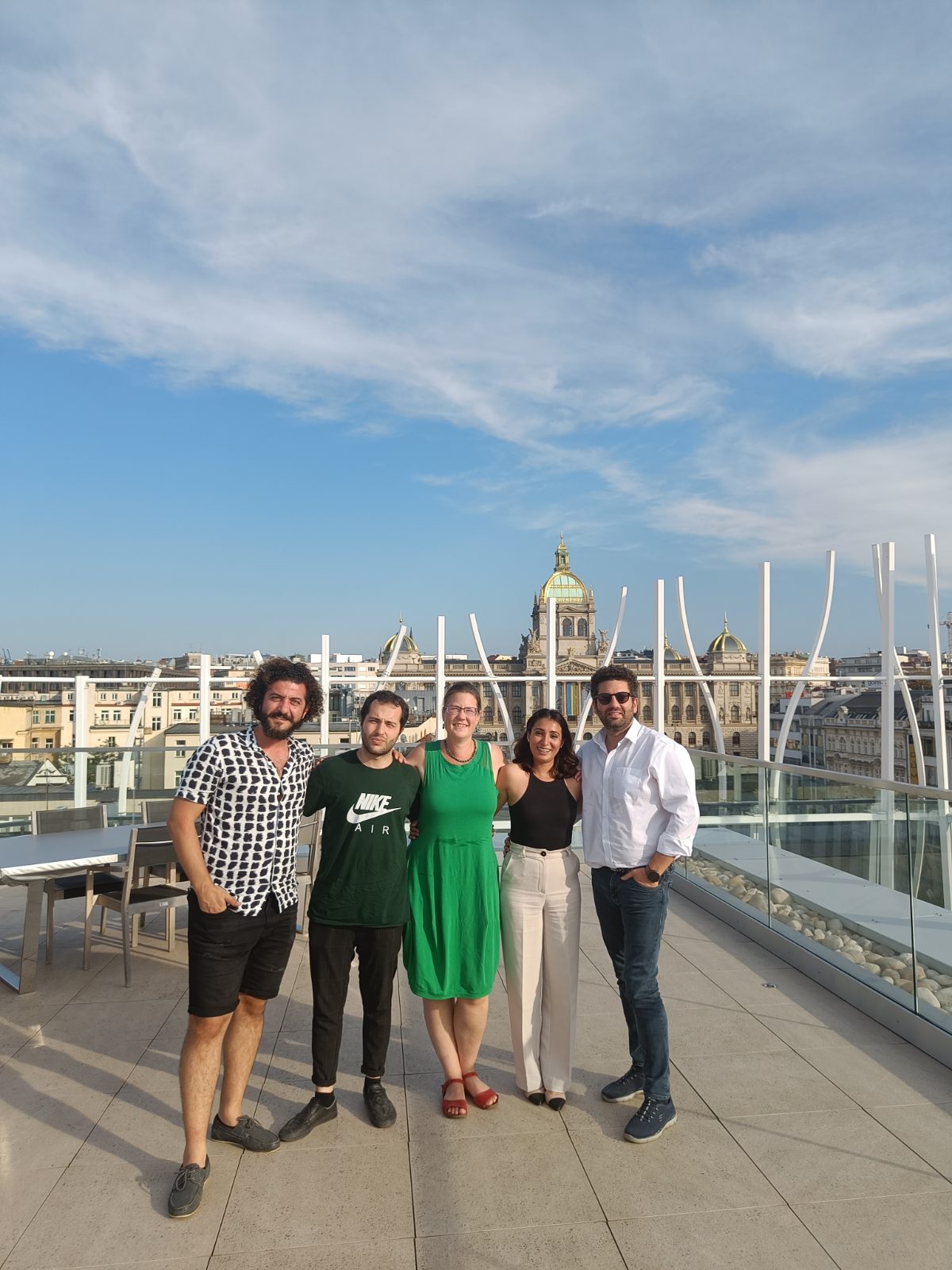 YeYe team members on a rooftop terrace in Prague