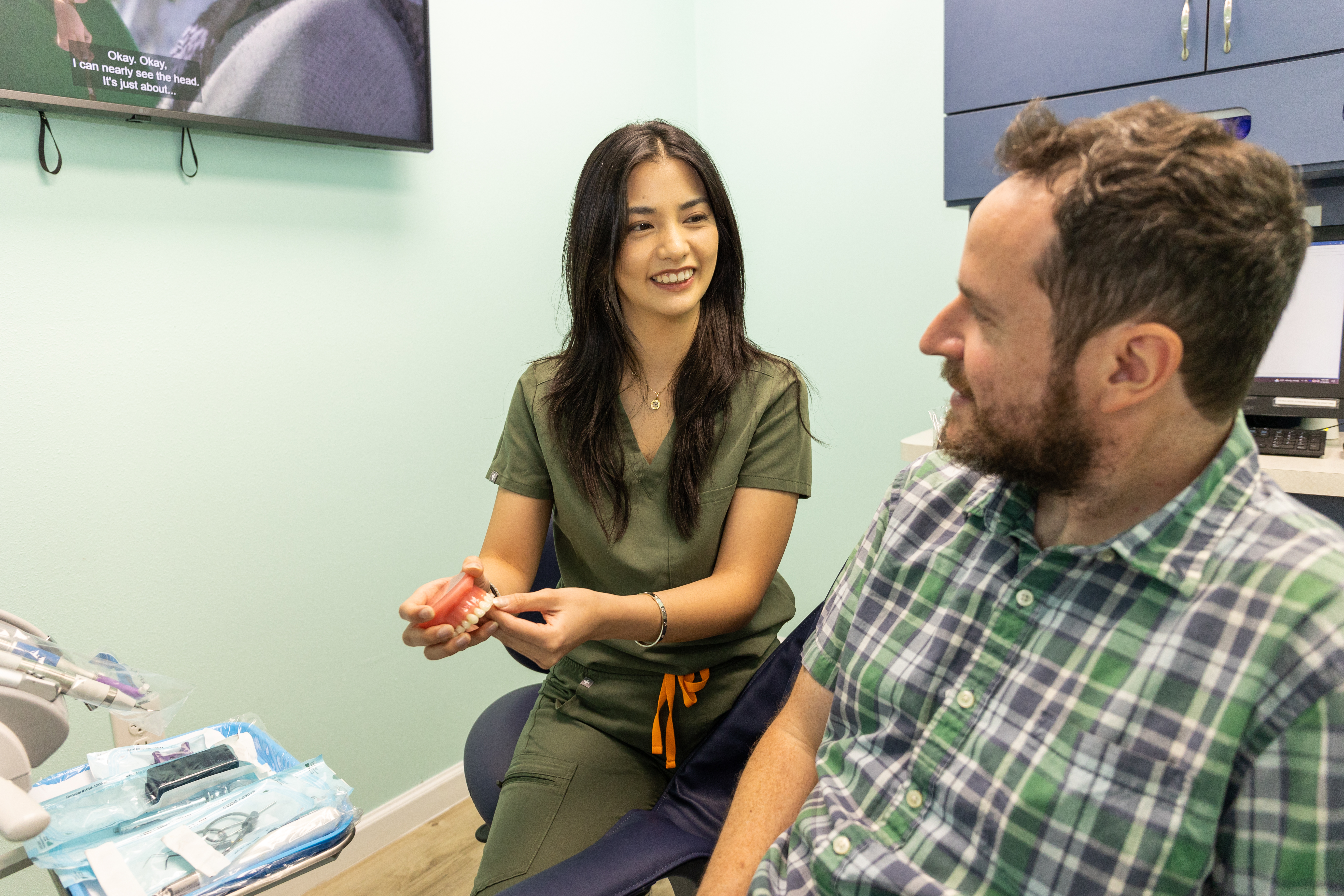 Dentist Consulting Patient