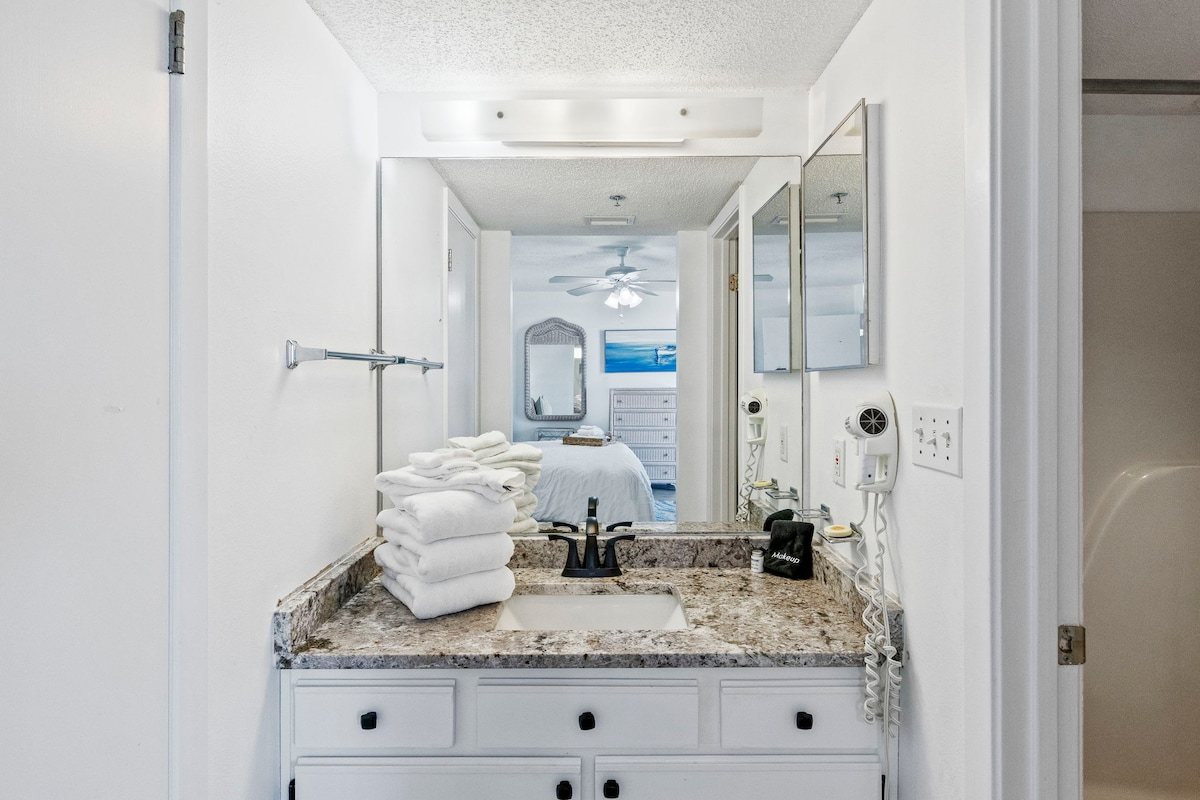Rinse the salt off at a granite vanity with real counter space, then get on with your evening