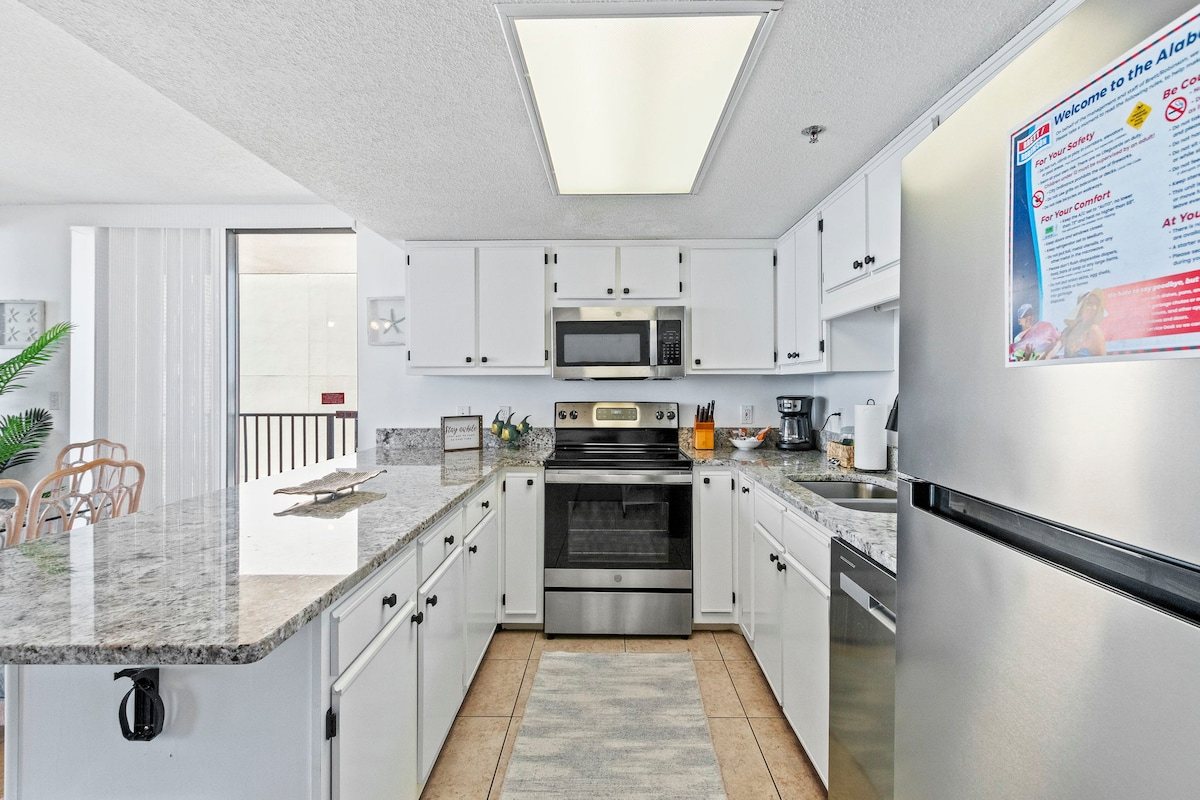 Unload the groceries onto real granite
