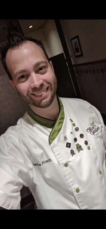 Mike Poarch in his Olive Garden manager uniform, before he learned to trade