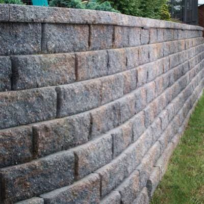 Sturdy block retaining wall for soil stabilization and landscape support