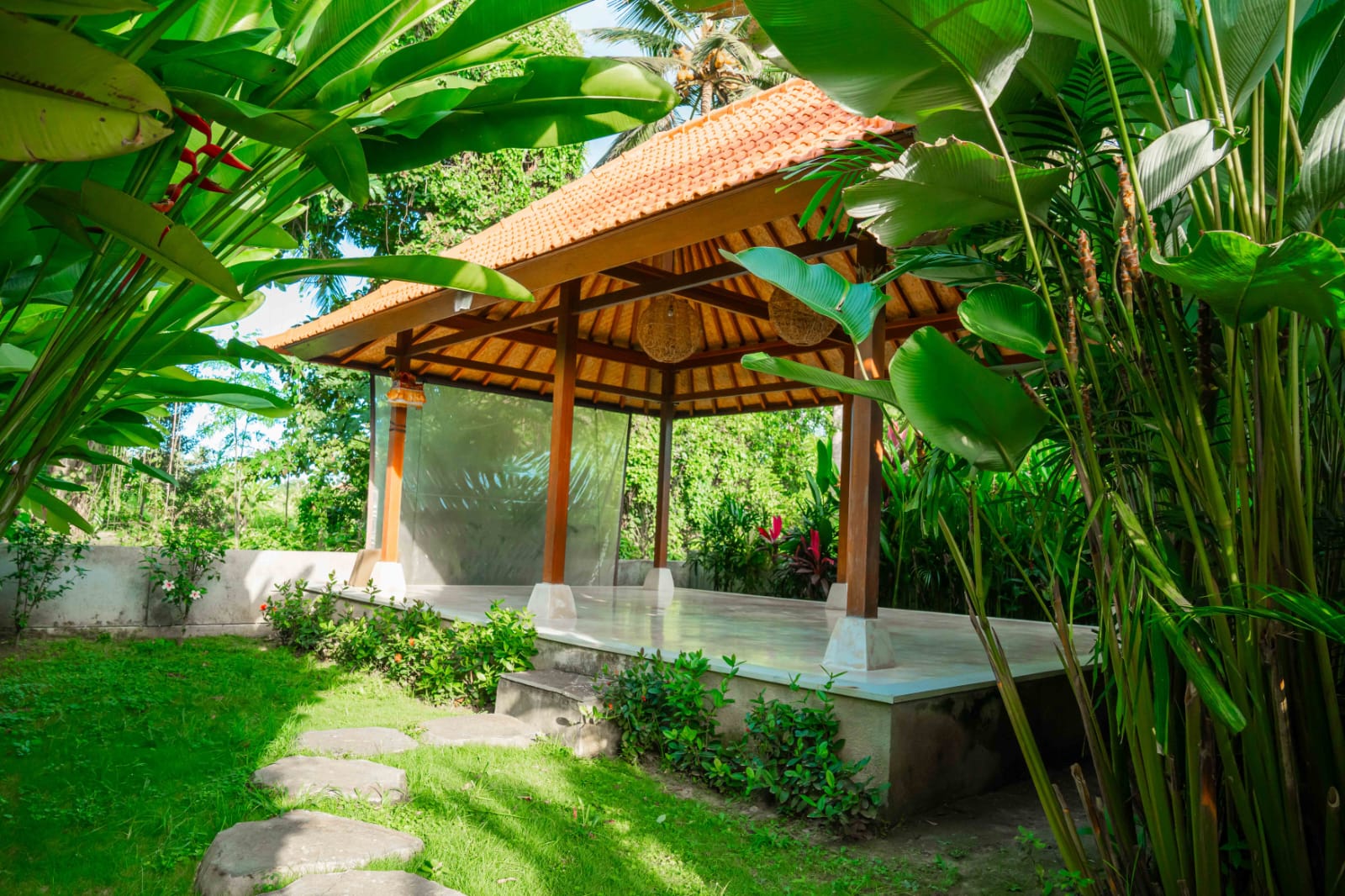An open air yoga shala in the gardens