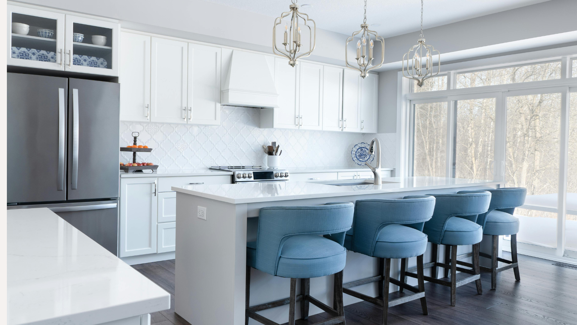 Warm condo kitchen with natural light and wood cabinetry