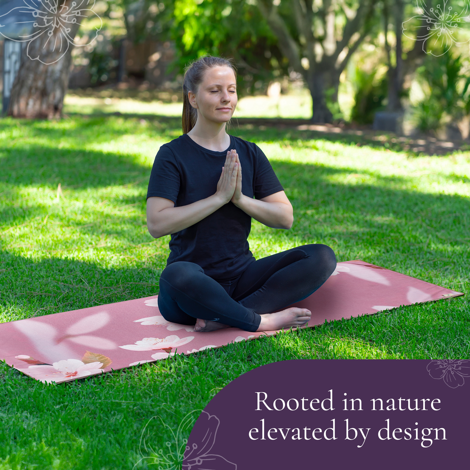 woman sitting outside on yoga mat praying