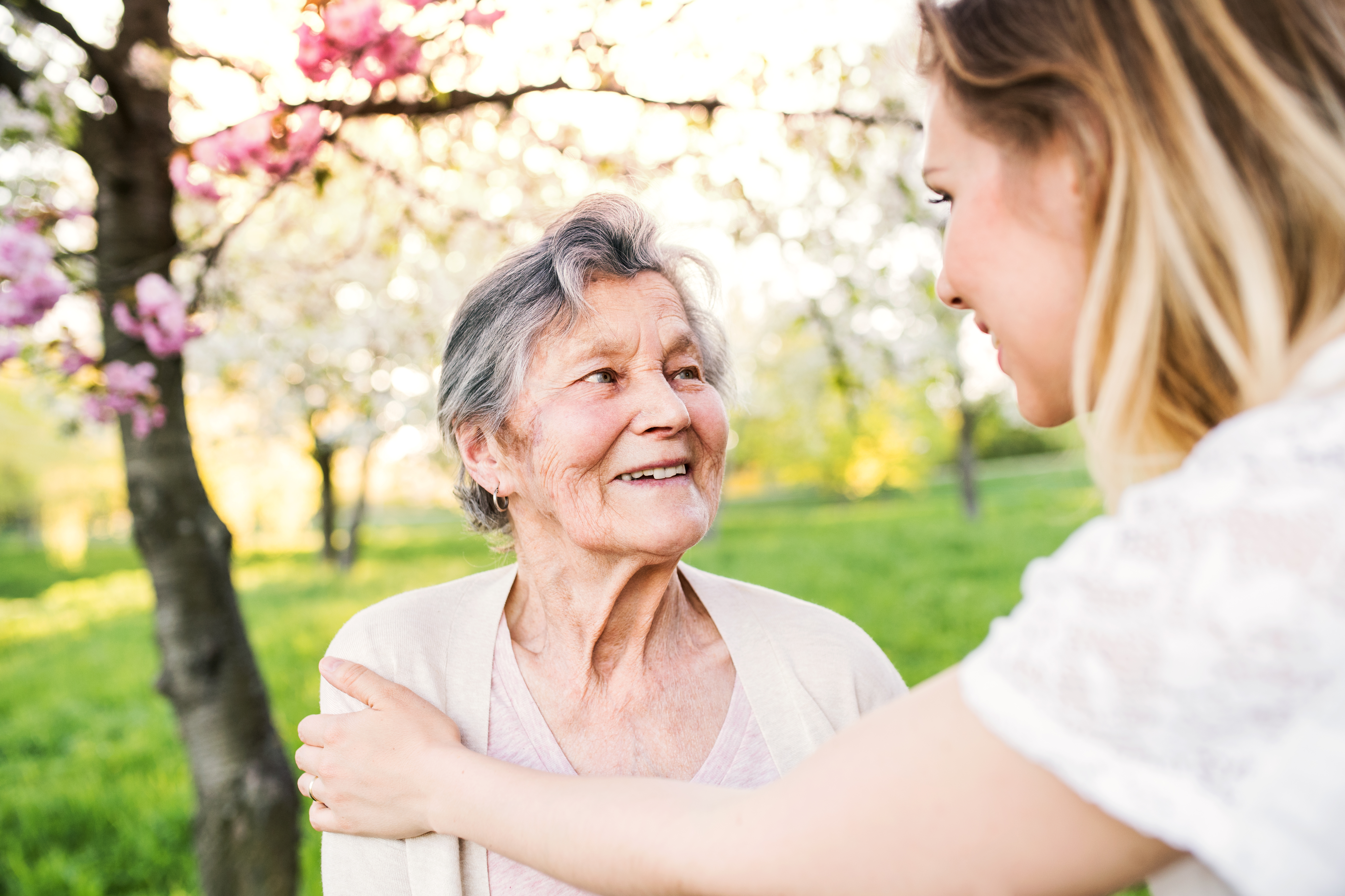 A Consultus caregiver supporting a senior man at home