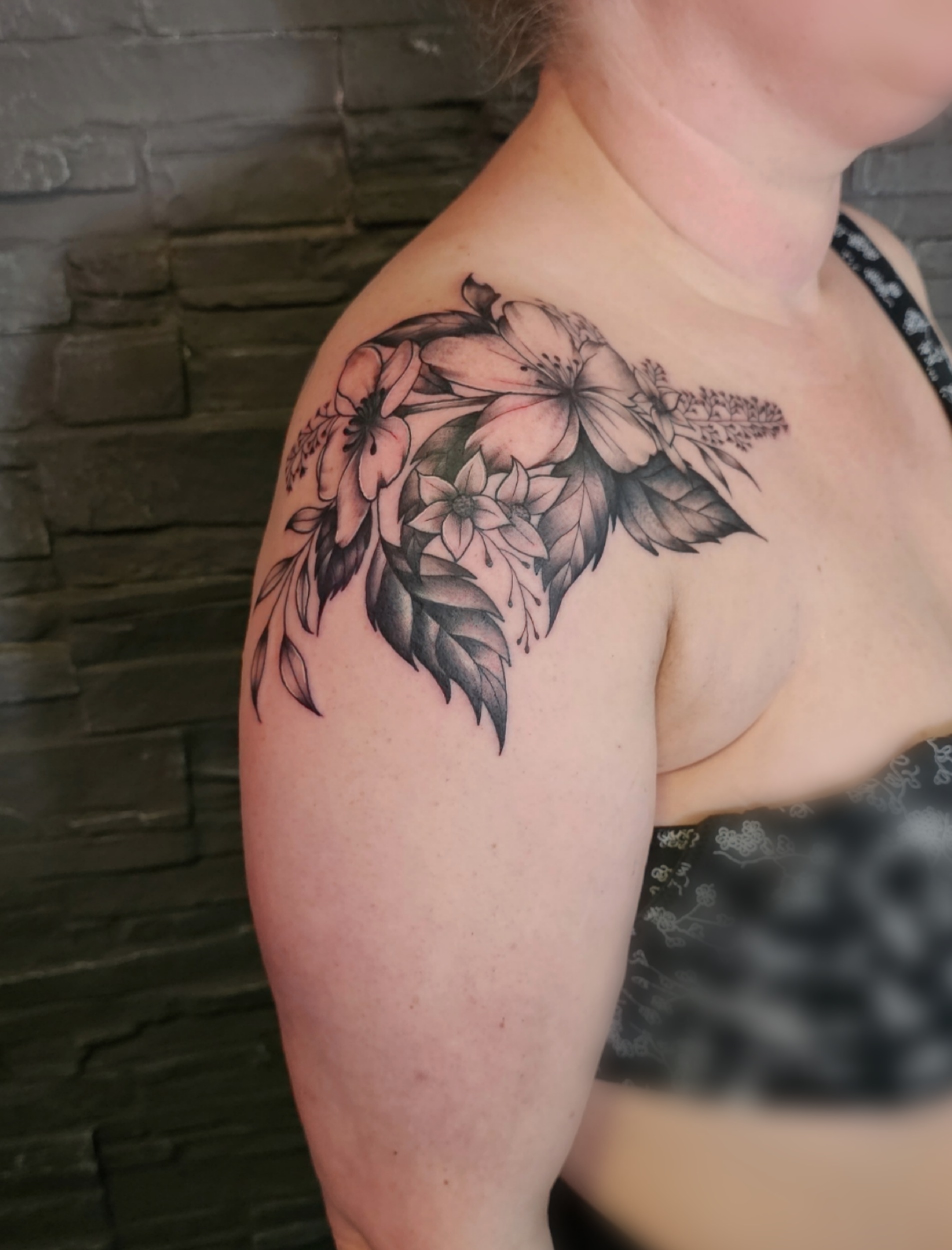 Floral tattoo in Black & Grey