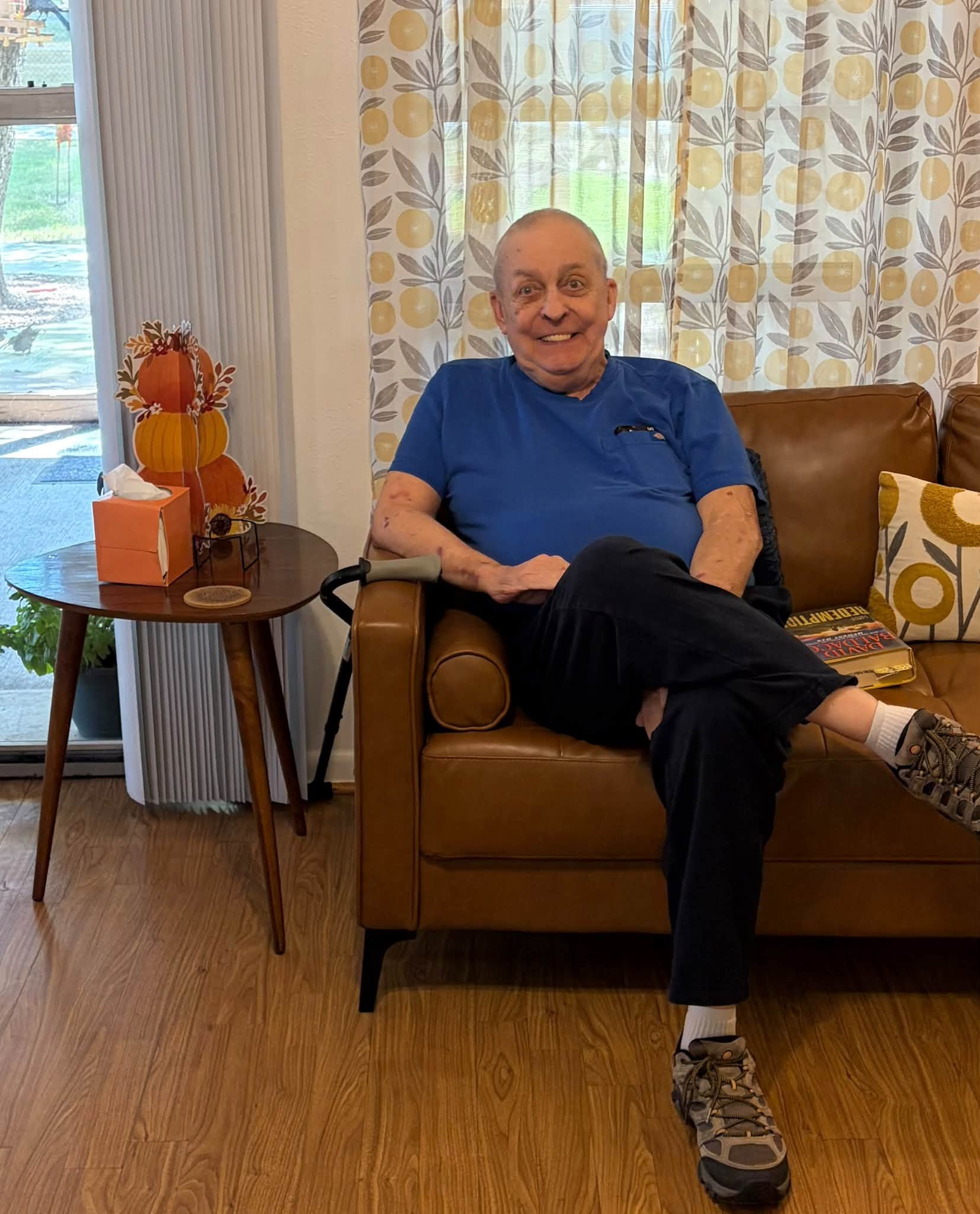 DEC participant smiling in the center’s welcoming living room
