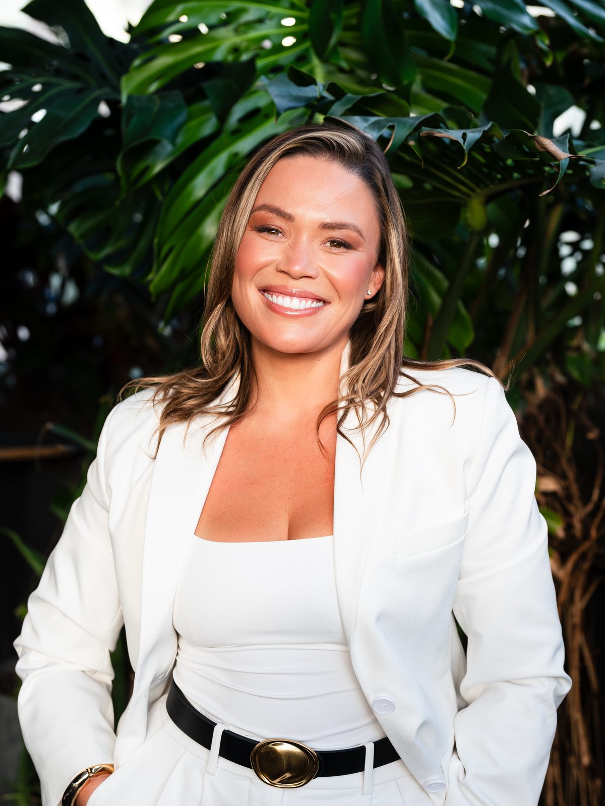 Renae Duval Usher, founder of Retail Media Commons, in a white suit