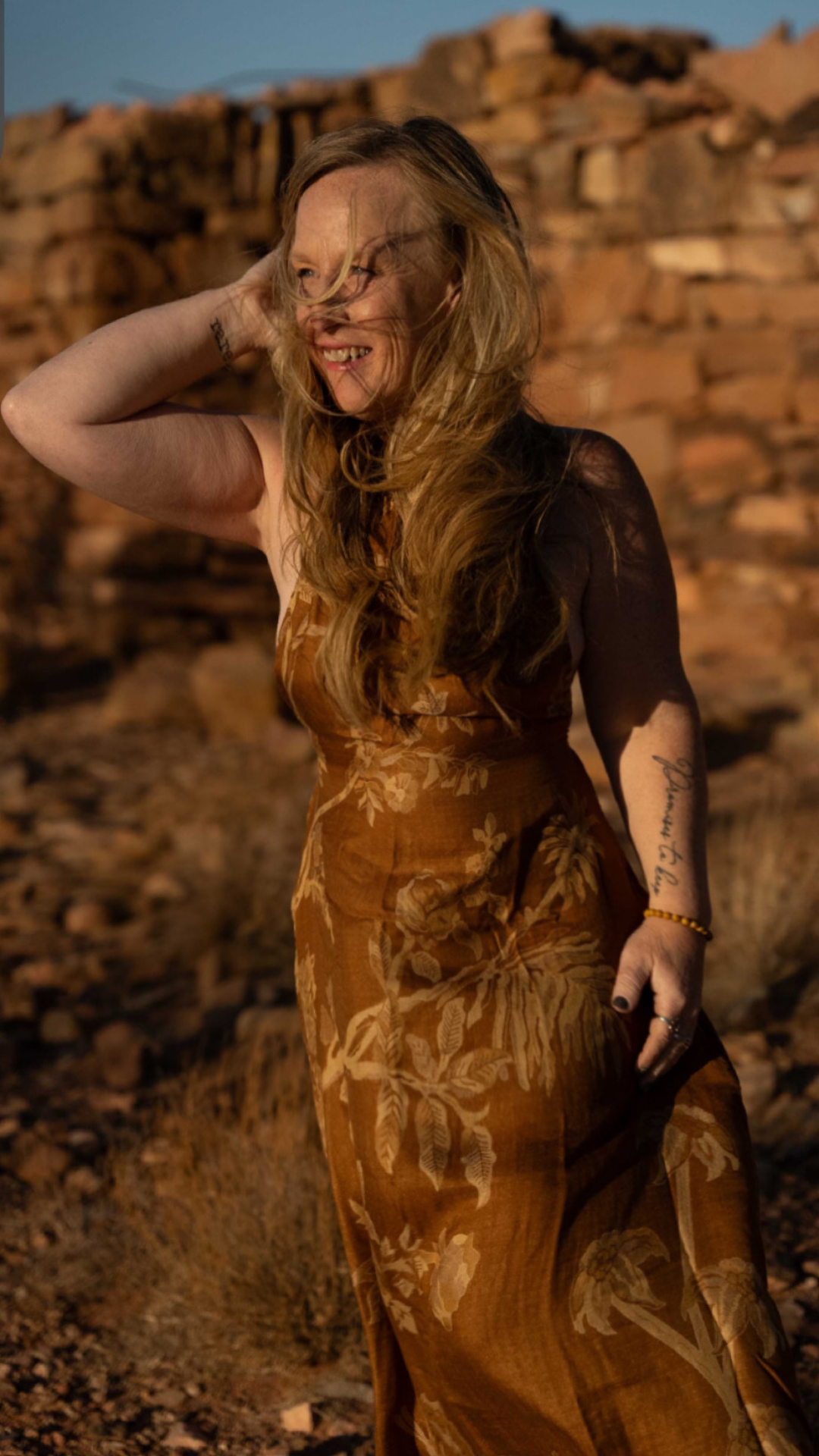 AlisaAnn outdoors in a desert landscape