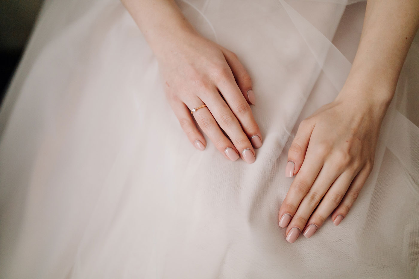 Fresh natural manicure with white blossoms at Imperial Aura Nails & Spa in Bakersfield