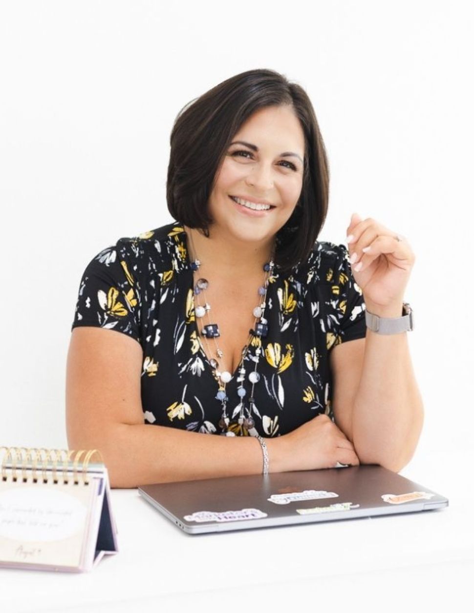 Kim's headshot with a testimonial about helping clients simplify their tech and business systems, making their operations more efficient.