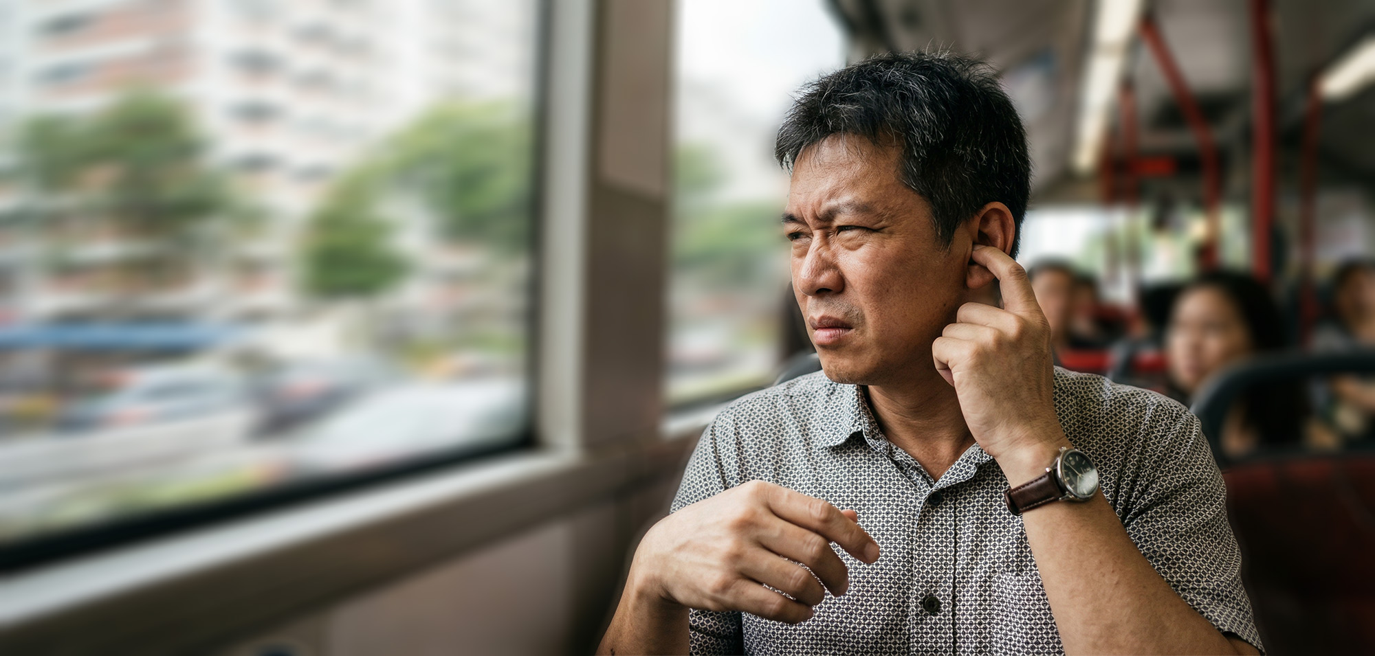 Patient experiencing ear discomfort