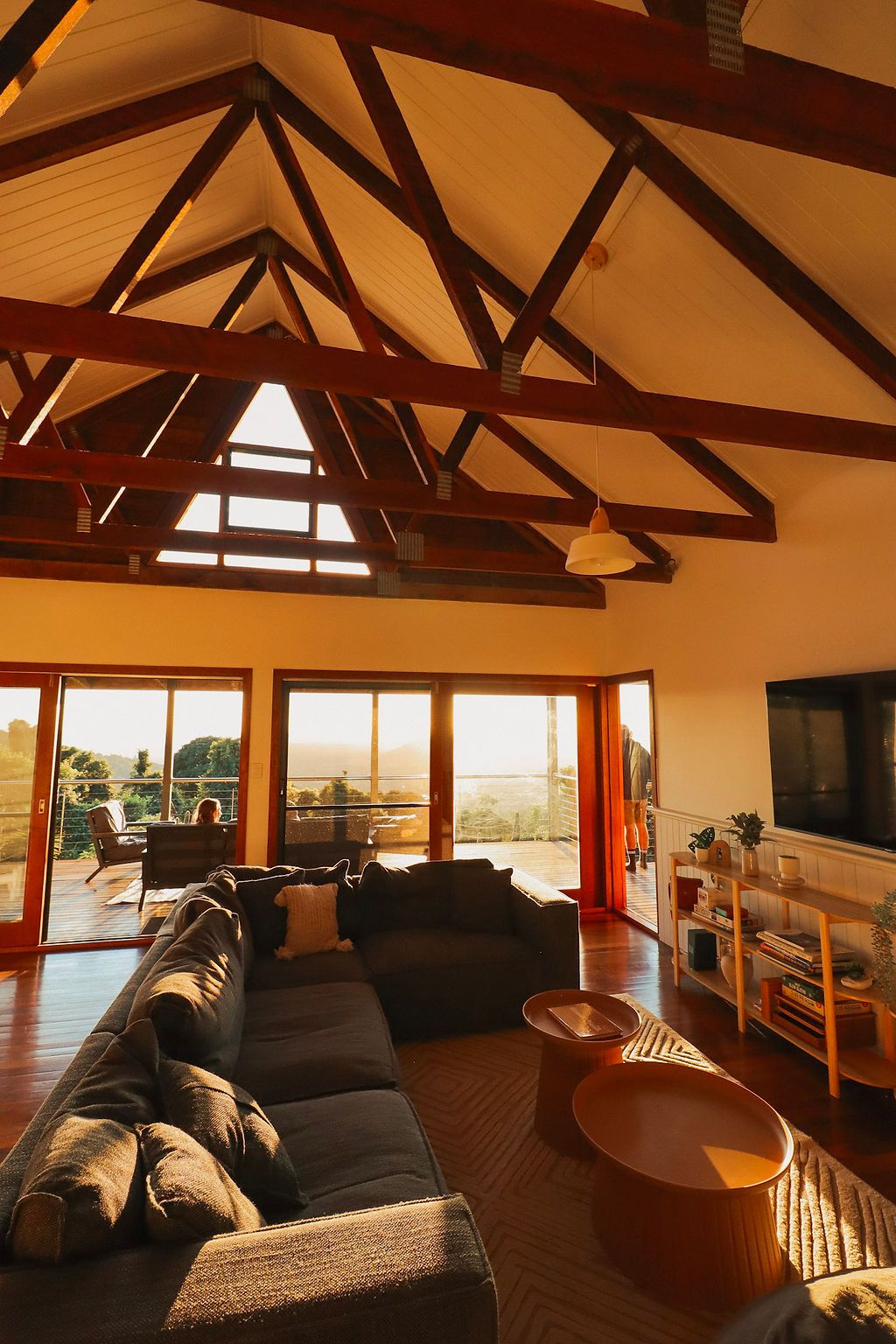 The living room under the timber trusses