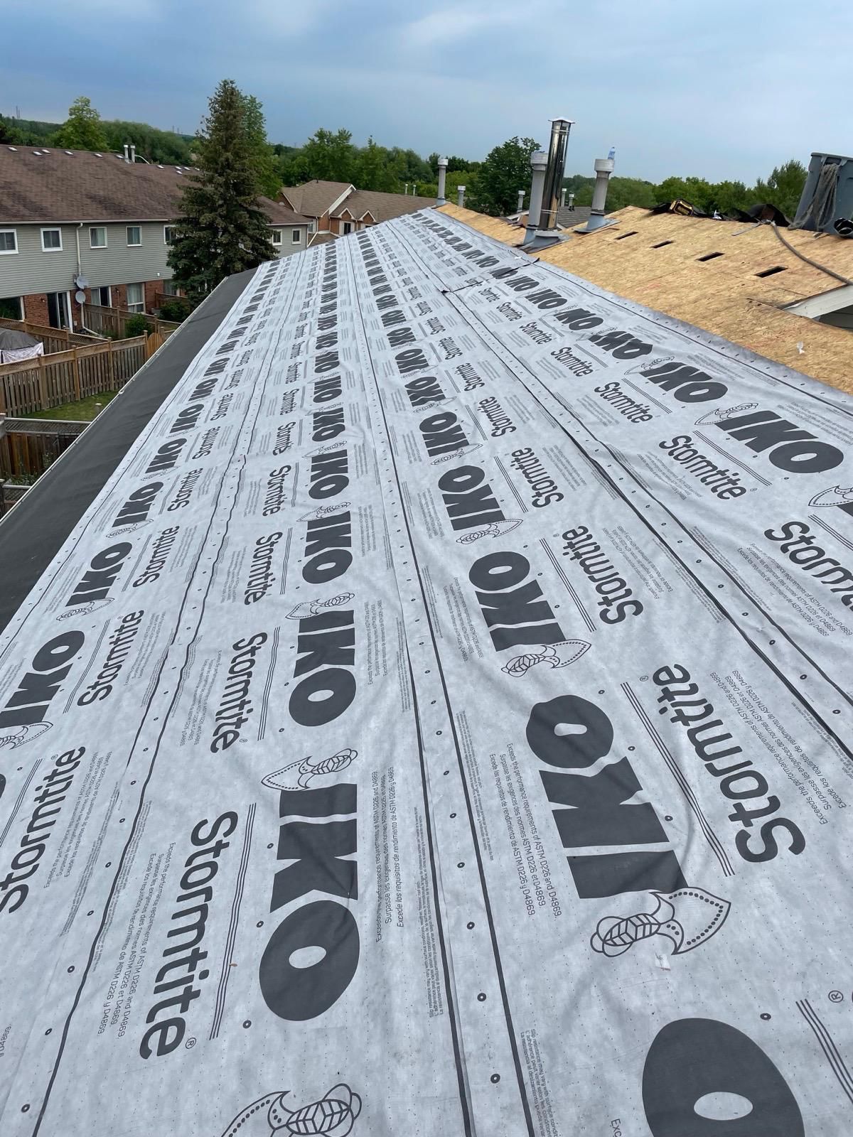 Commercial roofing underlayment prepared for a metal roofing system