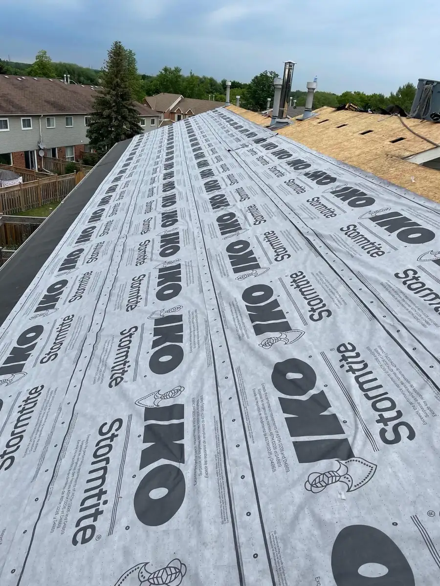 Commercial roofing underlayment prepared for a metal roofing system