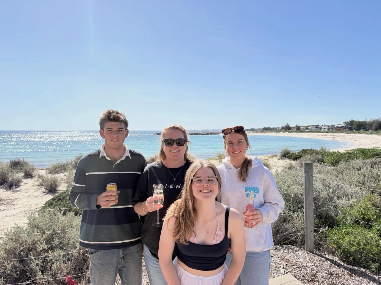 Nikki with her family at the beach