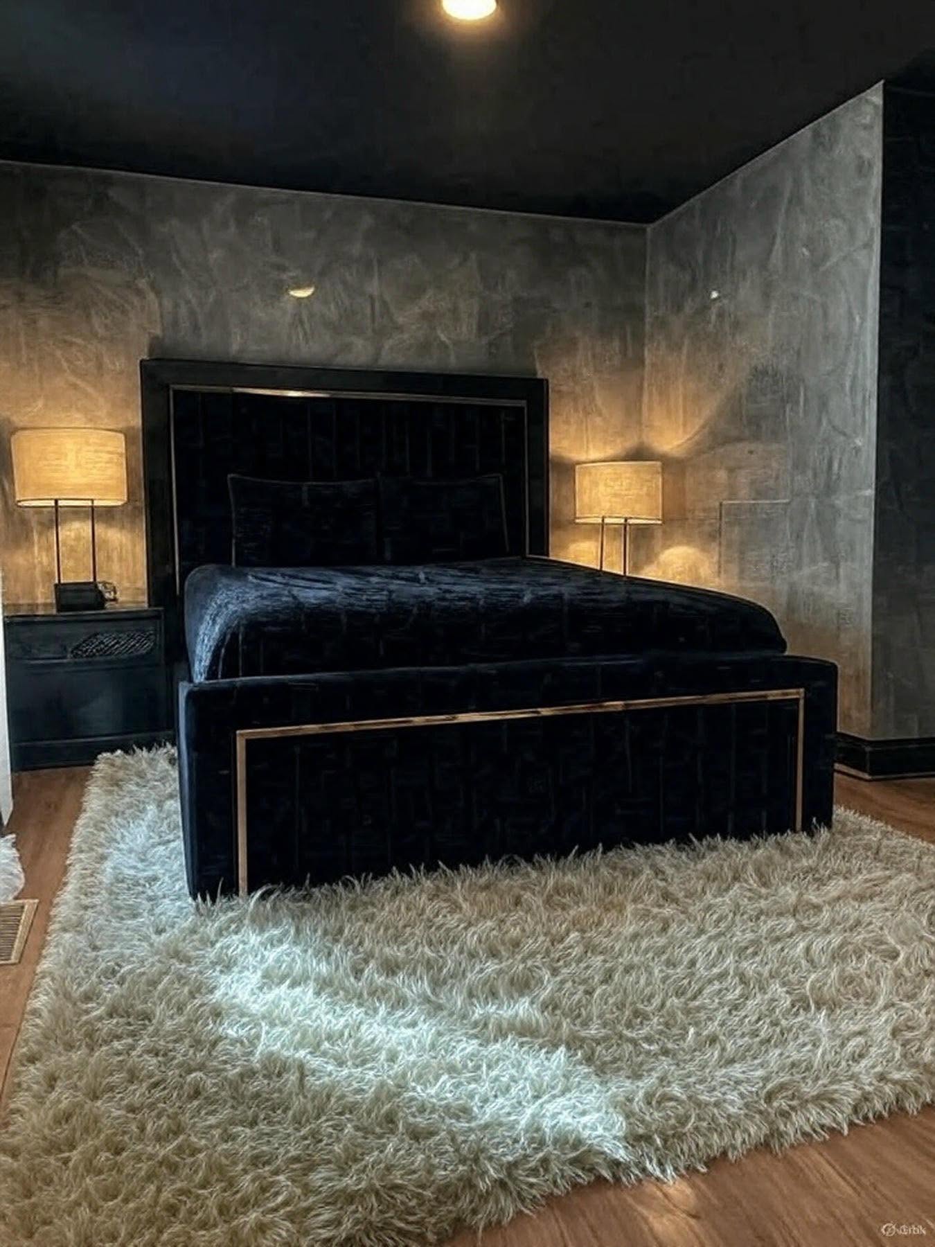 Custom Venetian plaster feature wall creating a dramatic luxury bedroom finish in St. Louis
