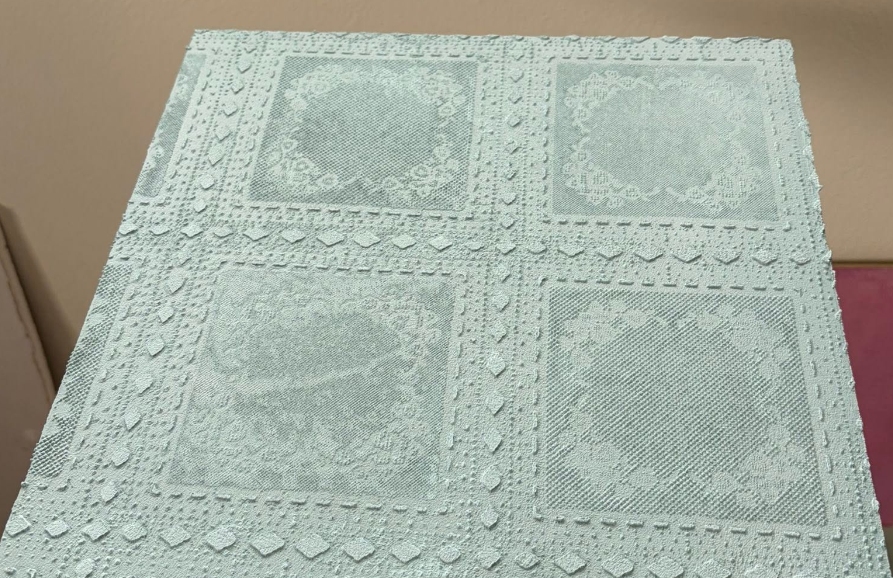Custom textured decorative plaster sample showcasing handcrafted finish techniques
