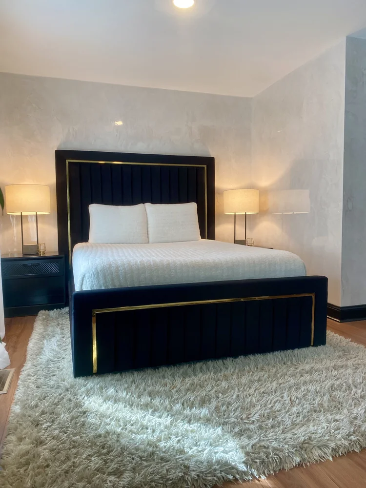 Hand-applied Venetian plaster bedroom walls with soft movement and polished finish