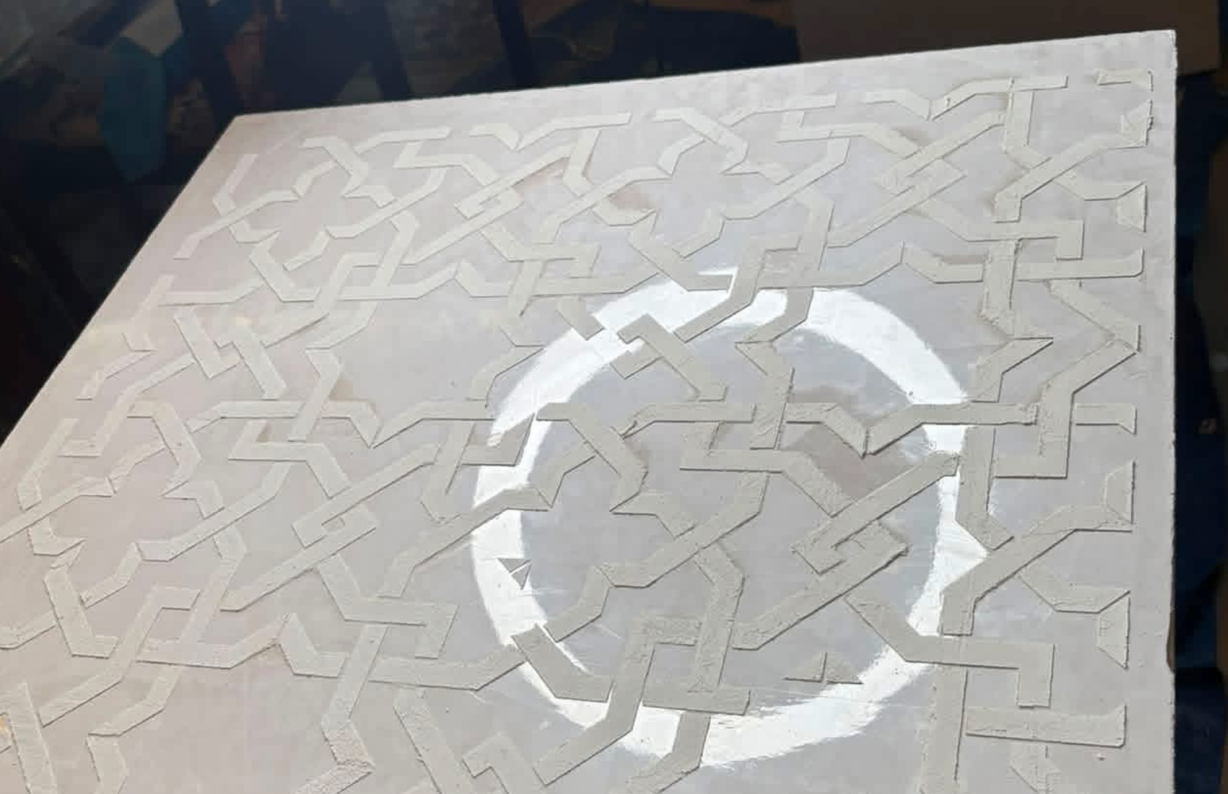 Handcrafted polished Venetian plaster sample with raised geometric detailing by Venetian Artworks