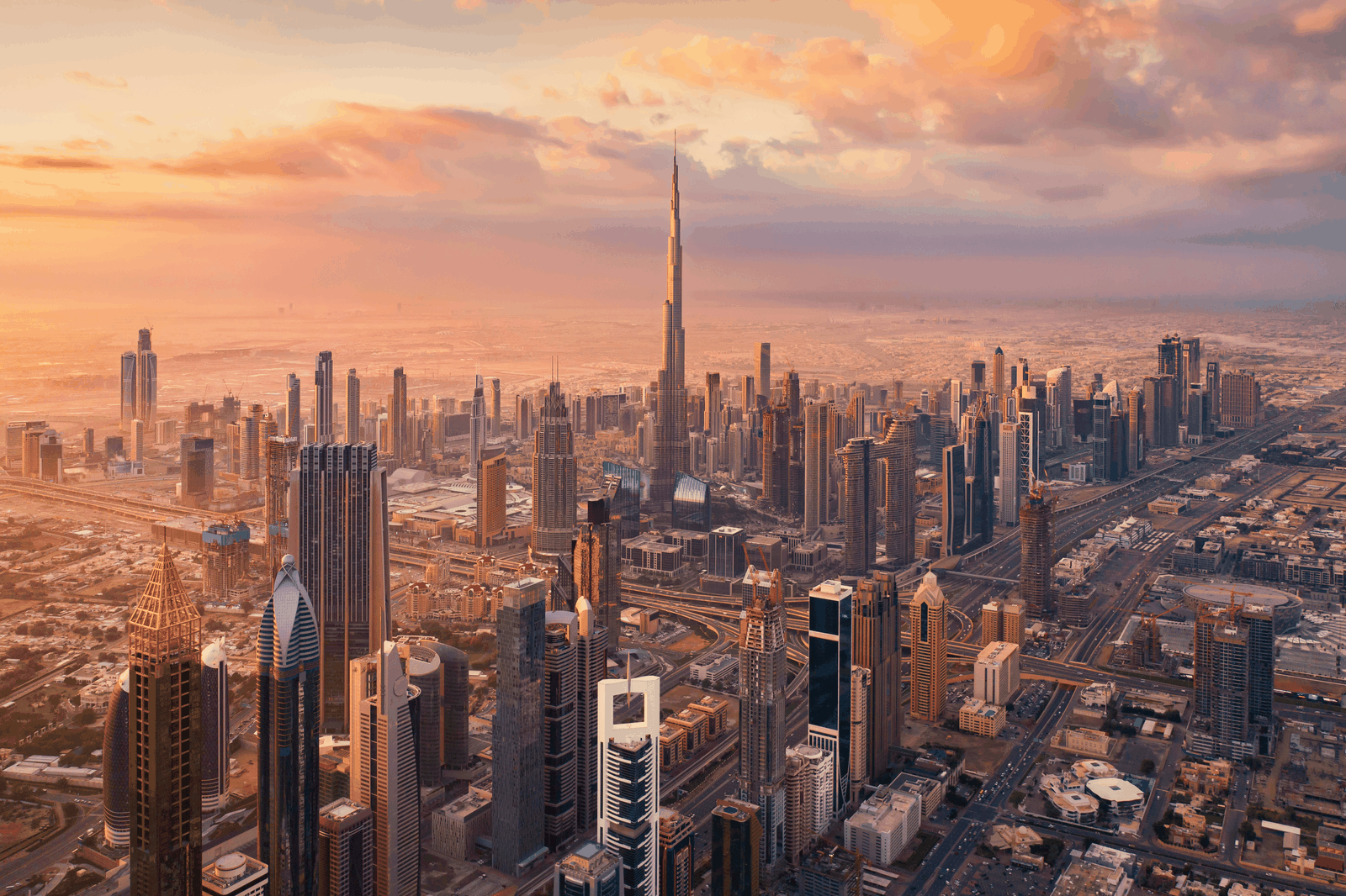 Downtown Dubai at sunset, with the Burj Khalifa in the centre
