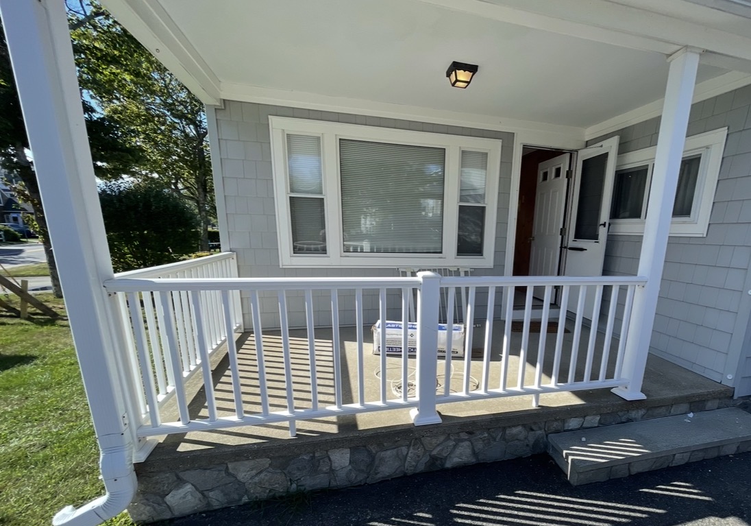 Porch railing installation — coastal southern Maine