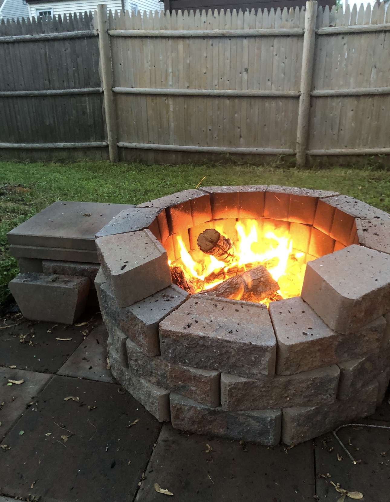 Stone fire pit installation — backyard hardscape project