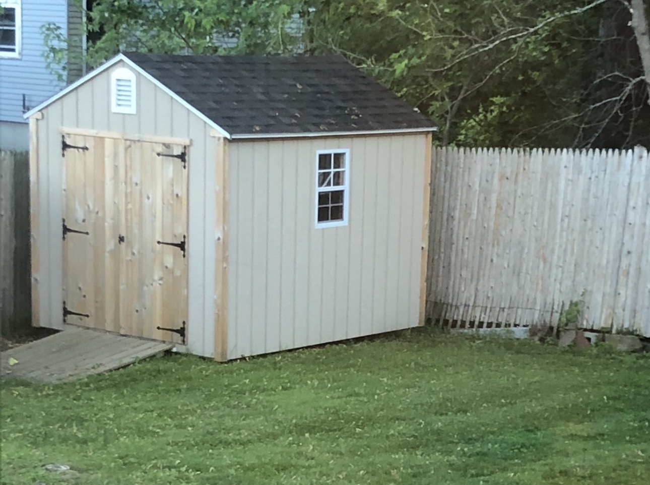 Shed build — completed with window, ramp, and hardware