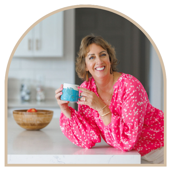 Shannon Lopez home organizer Lake Havasu City AZ smiling in organized kitchen after project completion