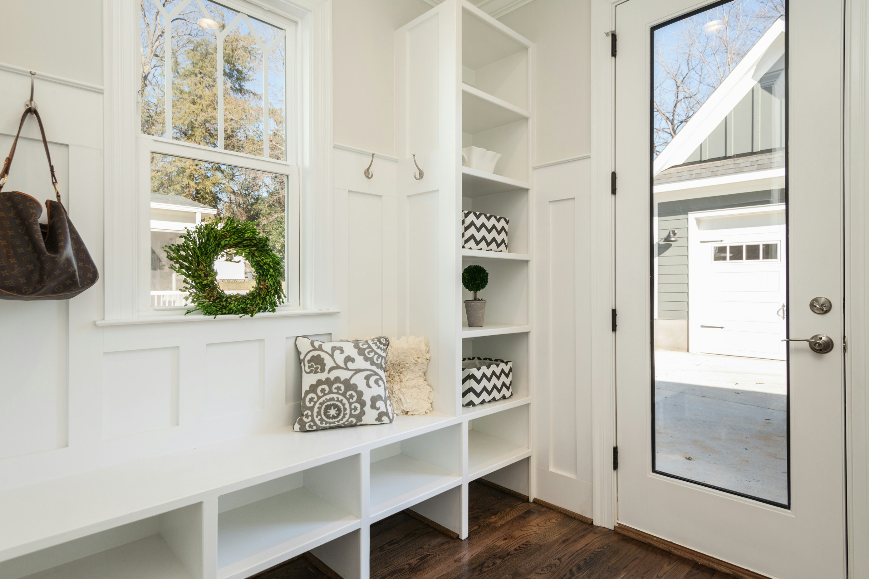 professional-home-organizing-kingman-az-settled-after-move-mudroom-with-built-in-shelves-bench-shoe-cubbies-practical-move-management professional-home-organizing-kingman-az-settled-after-move-mudroom-with-built-in-shelves-bench-shoe-cubbies-practical-move-management