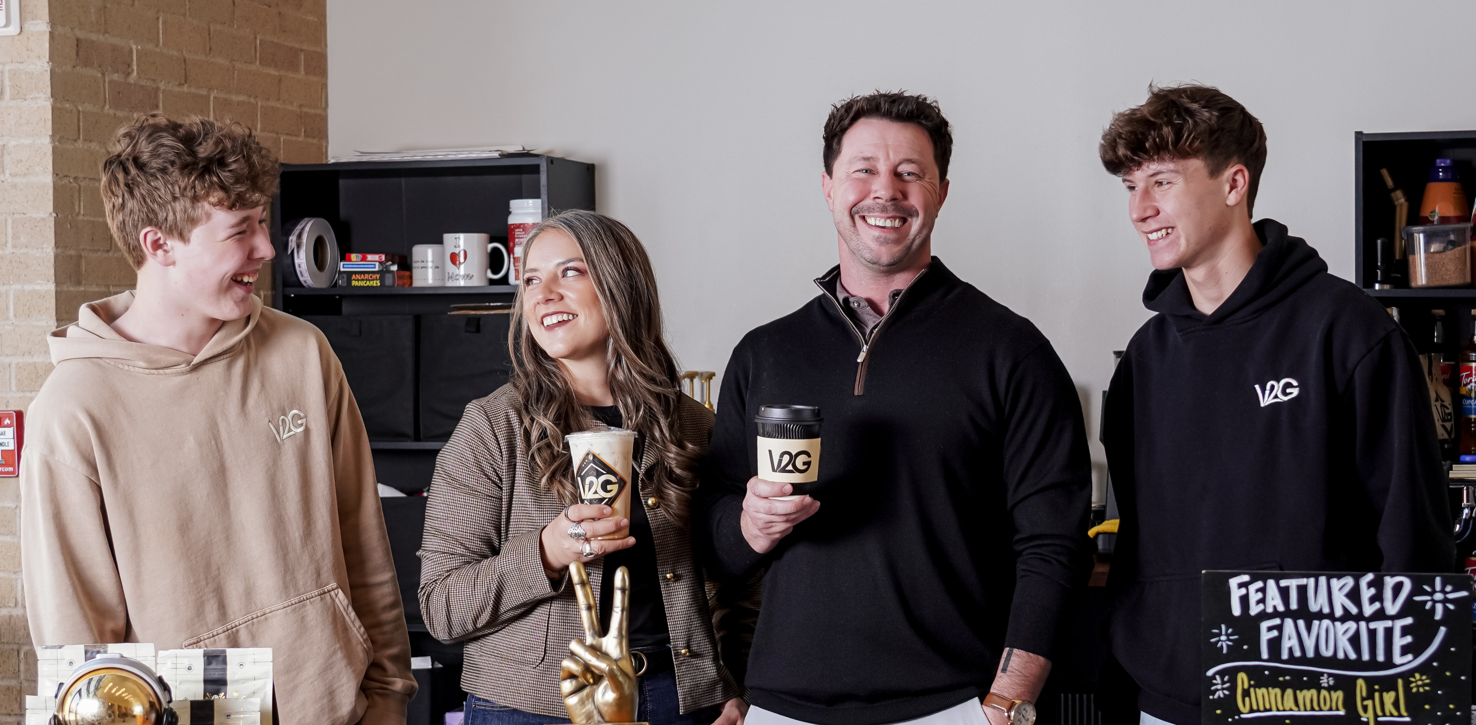 Team from Vibes 2 Go serving white coffee at Midland Community Theatre
