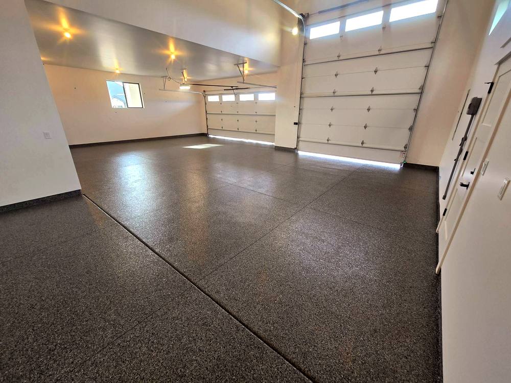 Finished charcoal flake garage floor in a Treasure Valley home