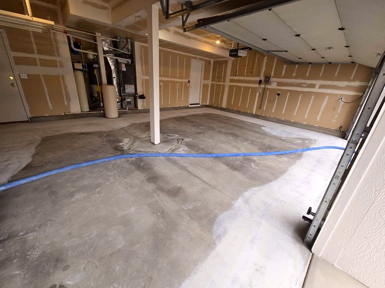 Garage floor mid-prep before coating